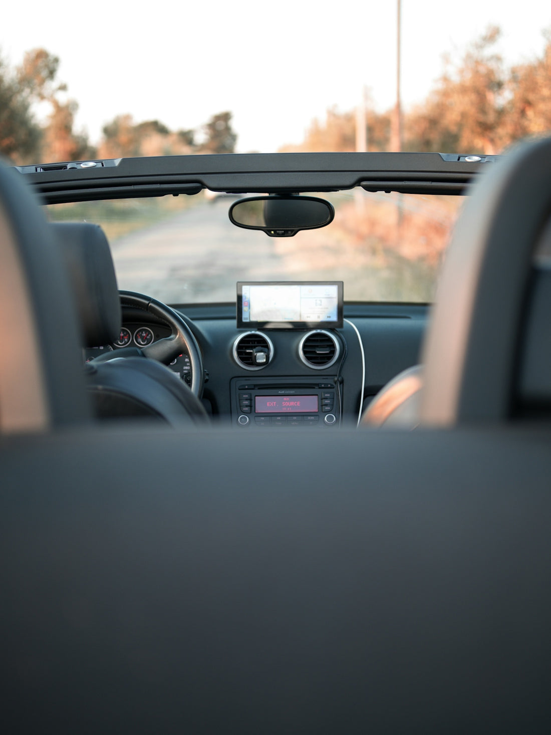 the dashboard of a car is shown with the sunroof